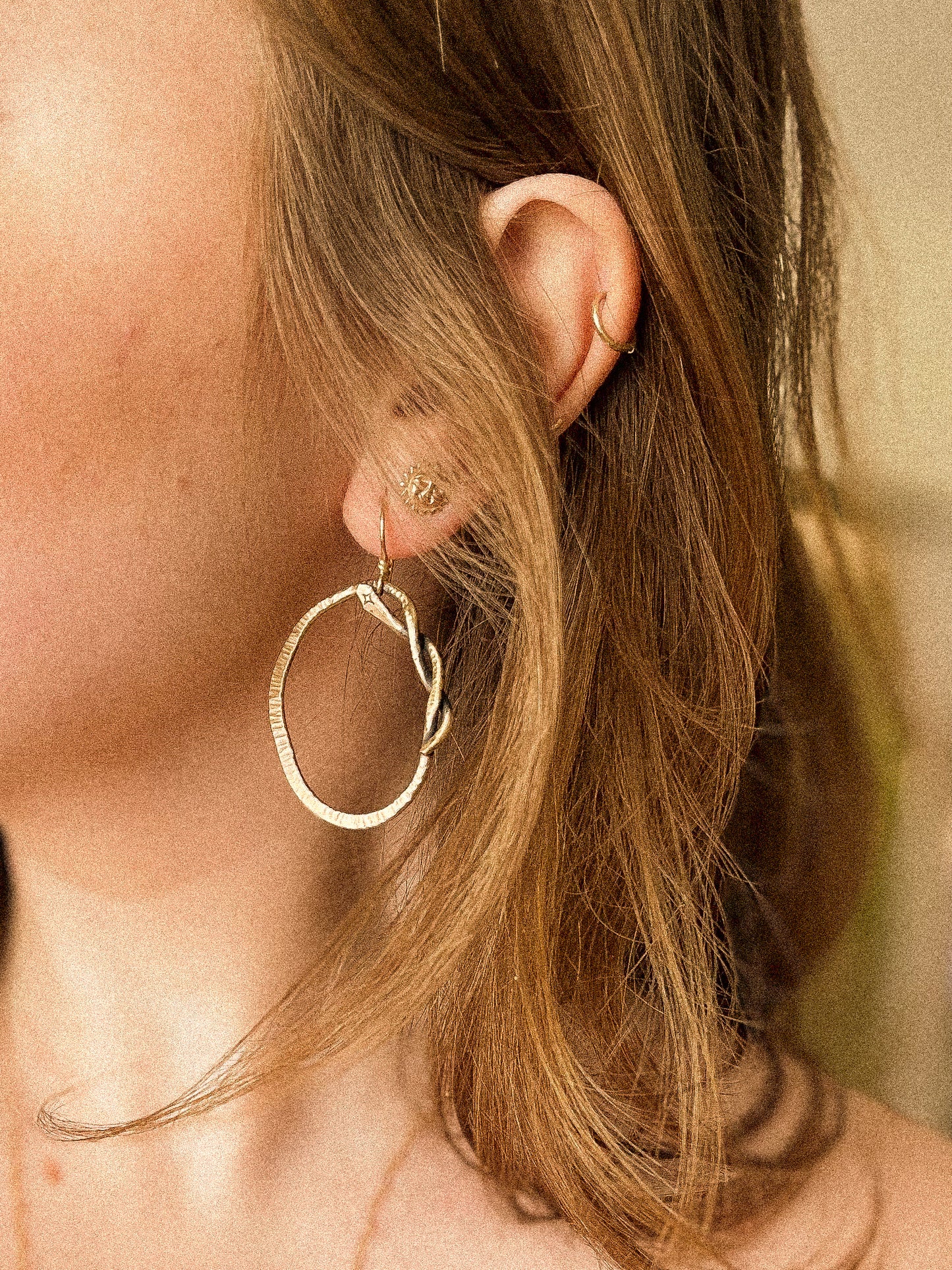 Twisted snake hoops