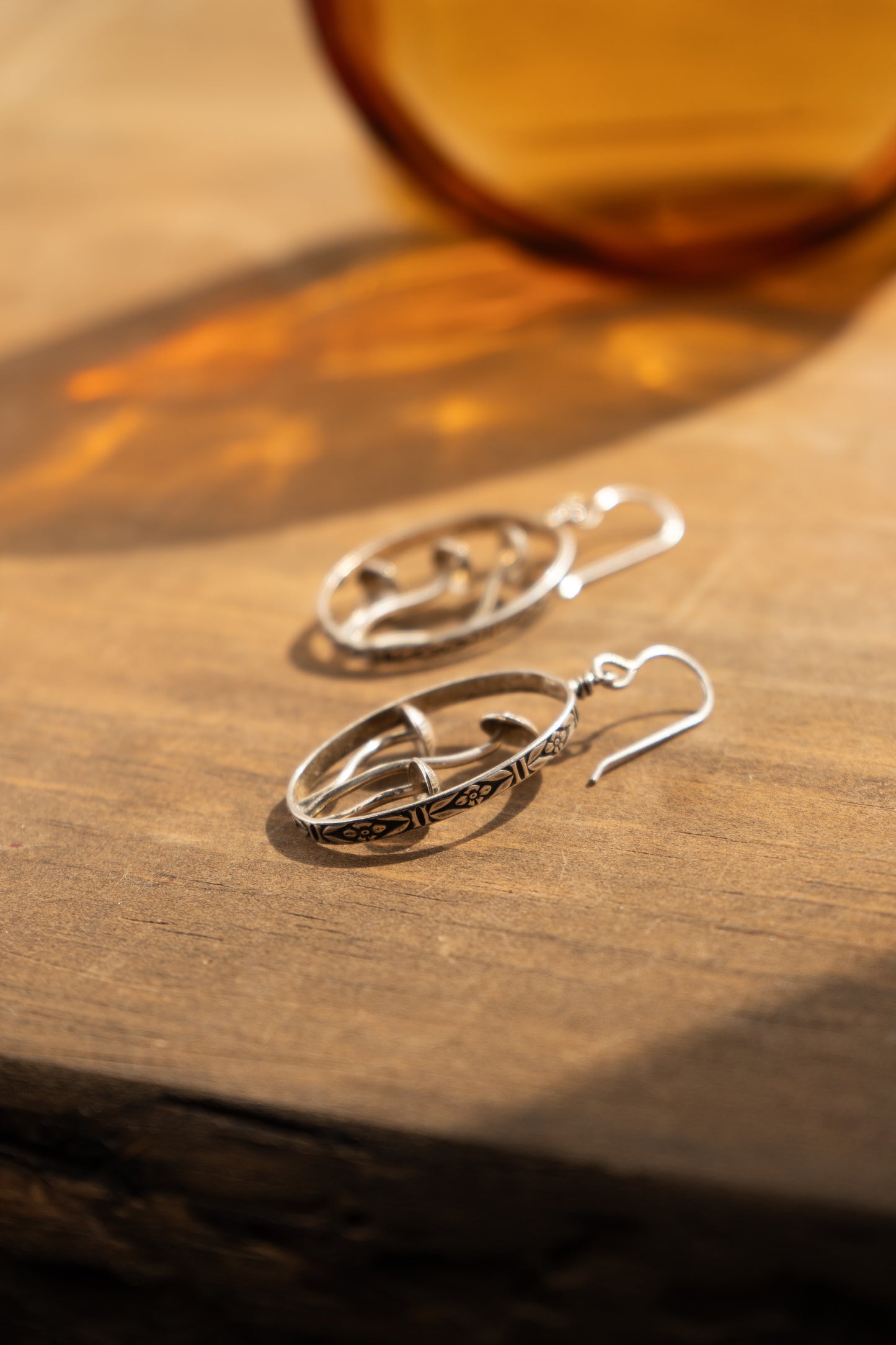 SILVER GROWING FROM WITHIN HOOPS